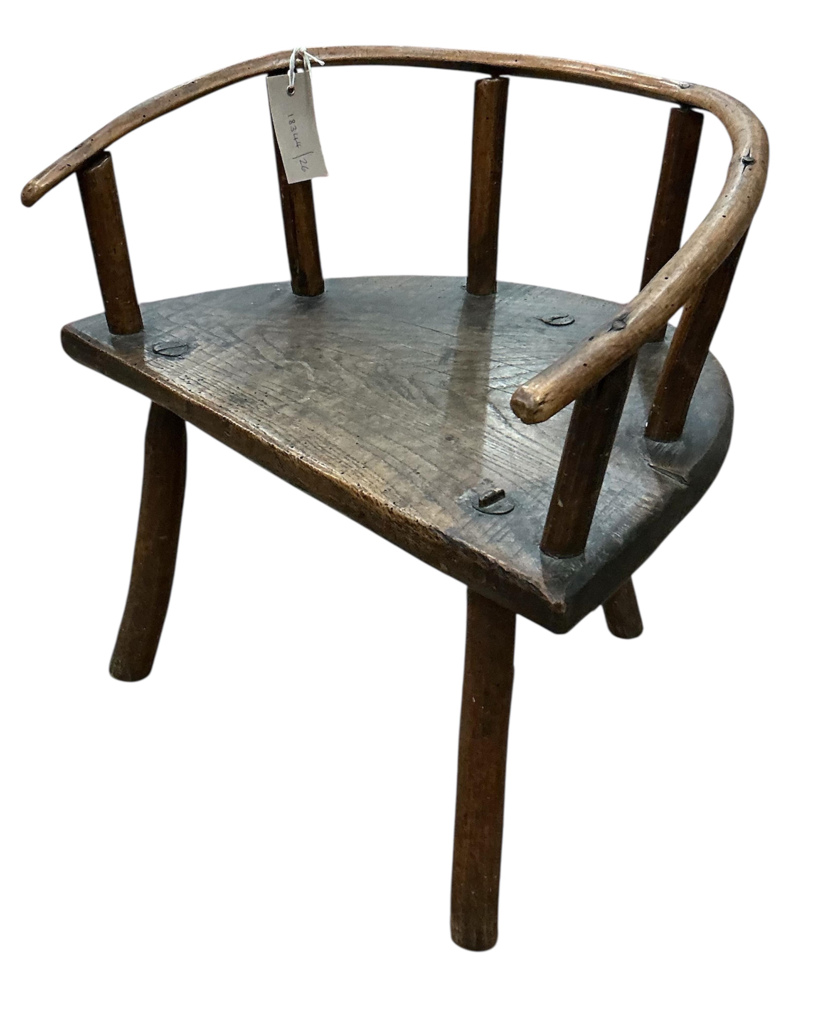A 19th century elm and beech child's primitive chair, width 45cm, depth 32cm, height 45cm